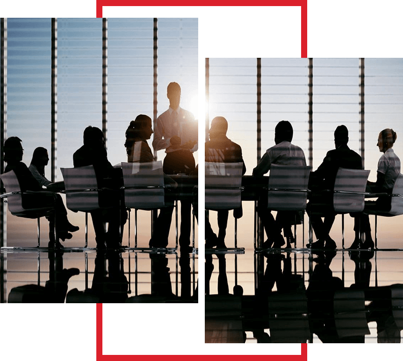 A group of people sitting at tables in front of windows.